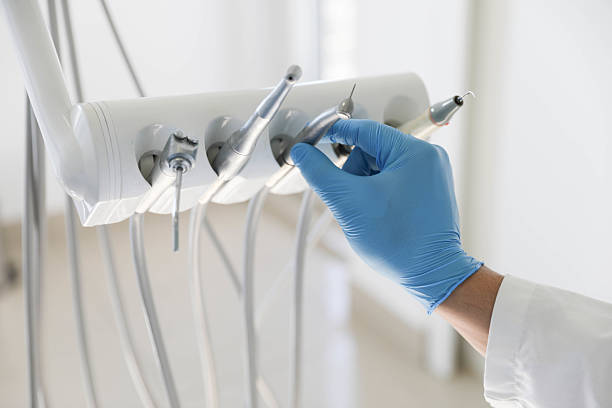 Professional Tooth Extraction technician working in Knoxville, IA